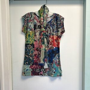 Elegant Red and Pink Blouse with Sophisticated Style